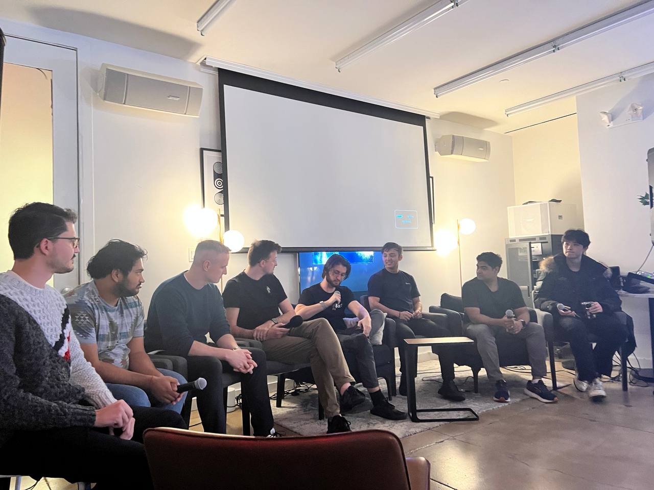 An eight person panel speaking at the Web3Builders event at Station3